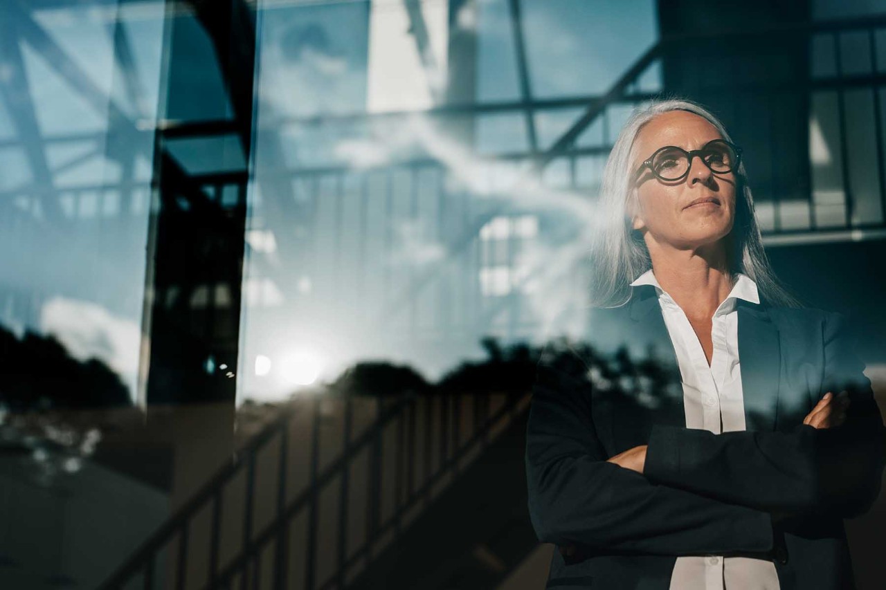 Businesswoman looking out of window